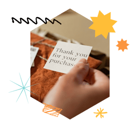 thank you note from a parcel delivery held by a hand