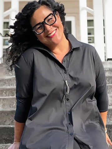 woman-wearing-stella-carakasi-black-top