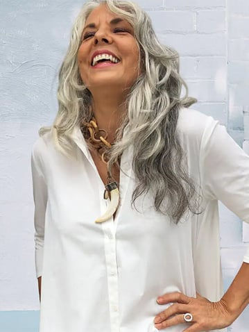 woman-wearing-stella-carakasi-white-top