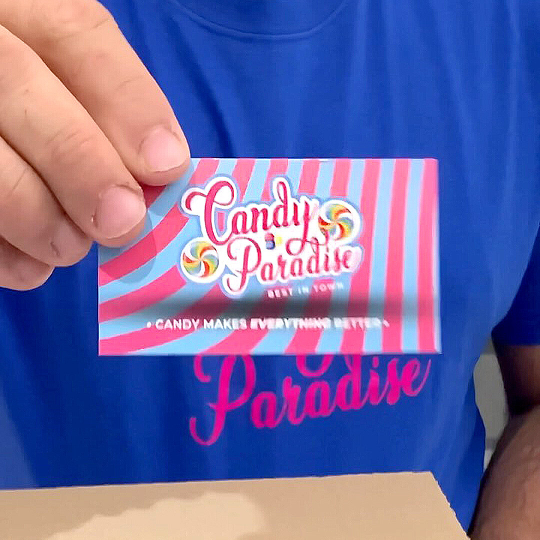 hand holding packet of candy paradise