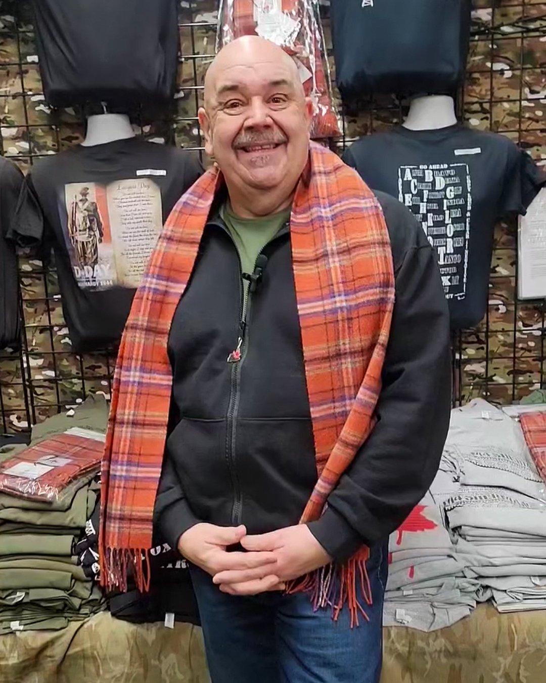 woman posing with d day tartan scarf