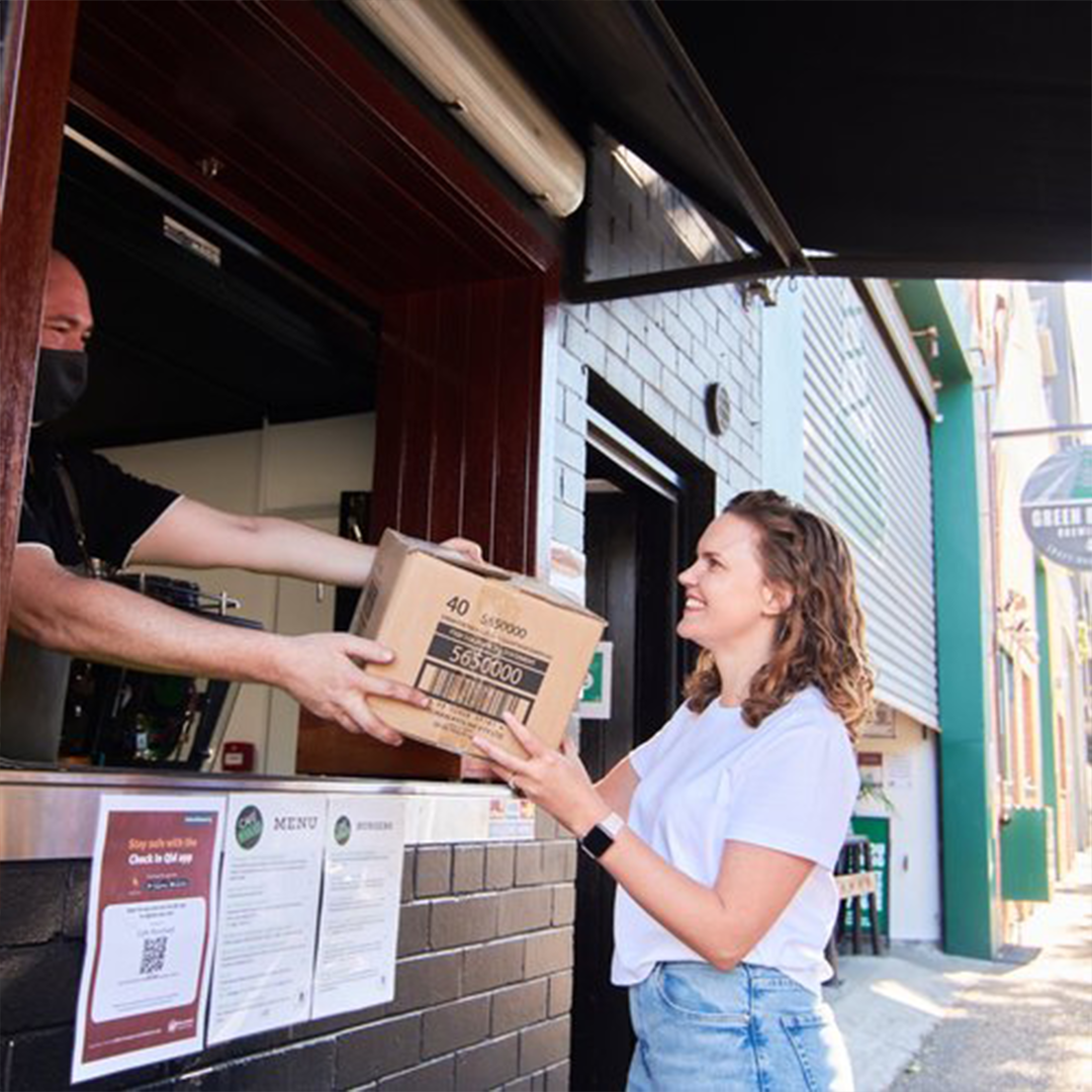 businessman giving recycled box to woman great plastic rescue