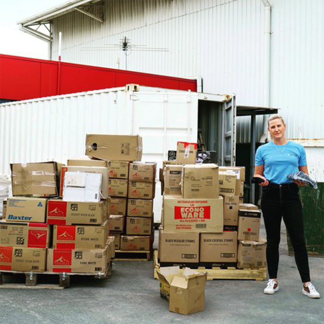 woman with stack of boxes great plastic rescue