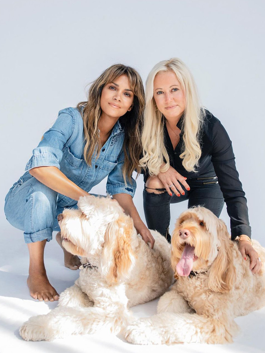 Halle Berry and founder of HappyBond pet probiotics with pet dogs