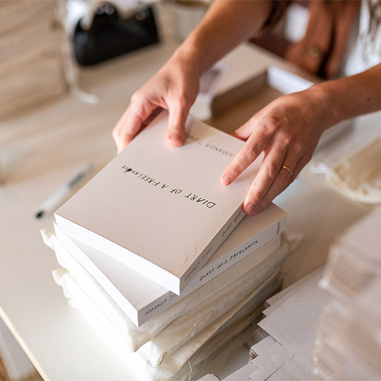 The Honest Jones female hands holding books products