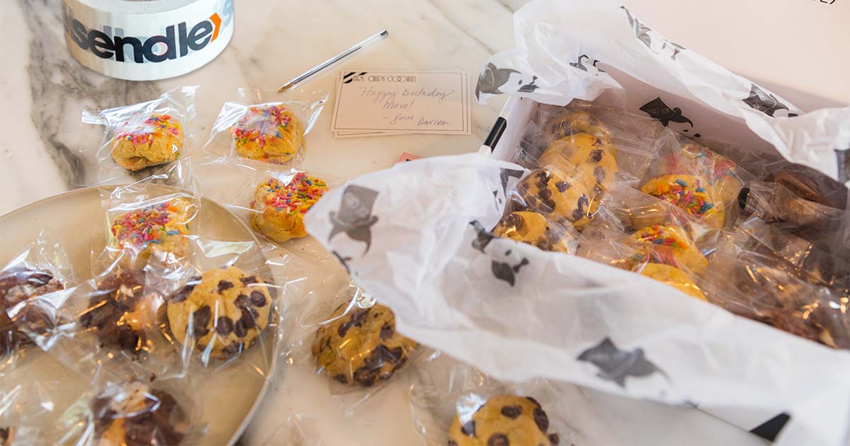 different kind of cookie chips laid out on top of a white marble kitchen counter top