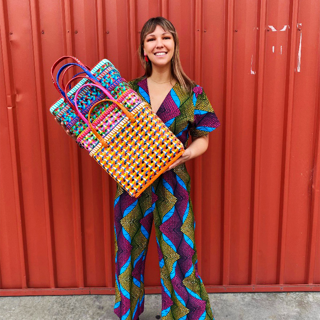 cassandra leever holding up a stack of pali basket