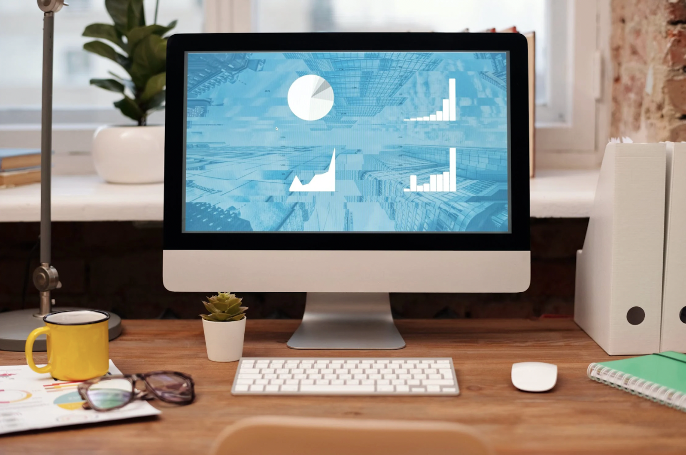 sendle image of computer monitor with charts in the office for work