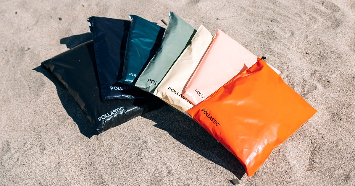 better packaging co pollastic mailers satchels colored sustainable plastic mailers made from ocean bound plastic displayed on sand